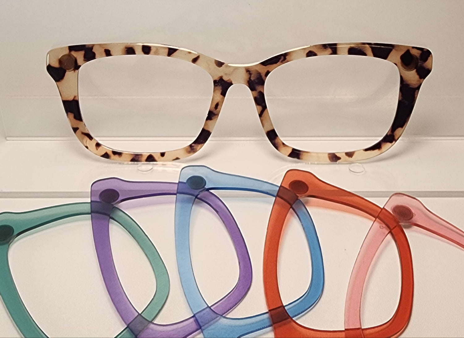 Topper Styles eyeglasses with leopard print frame and colorful options 