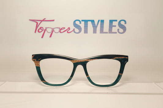 Green eyeglasses with gold accents 