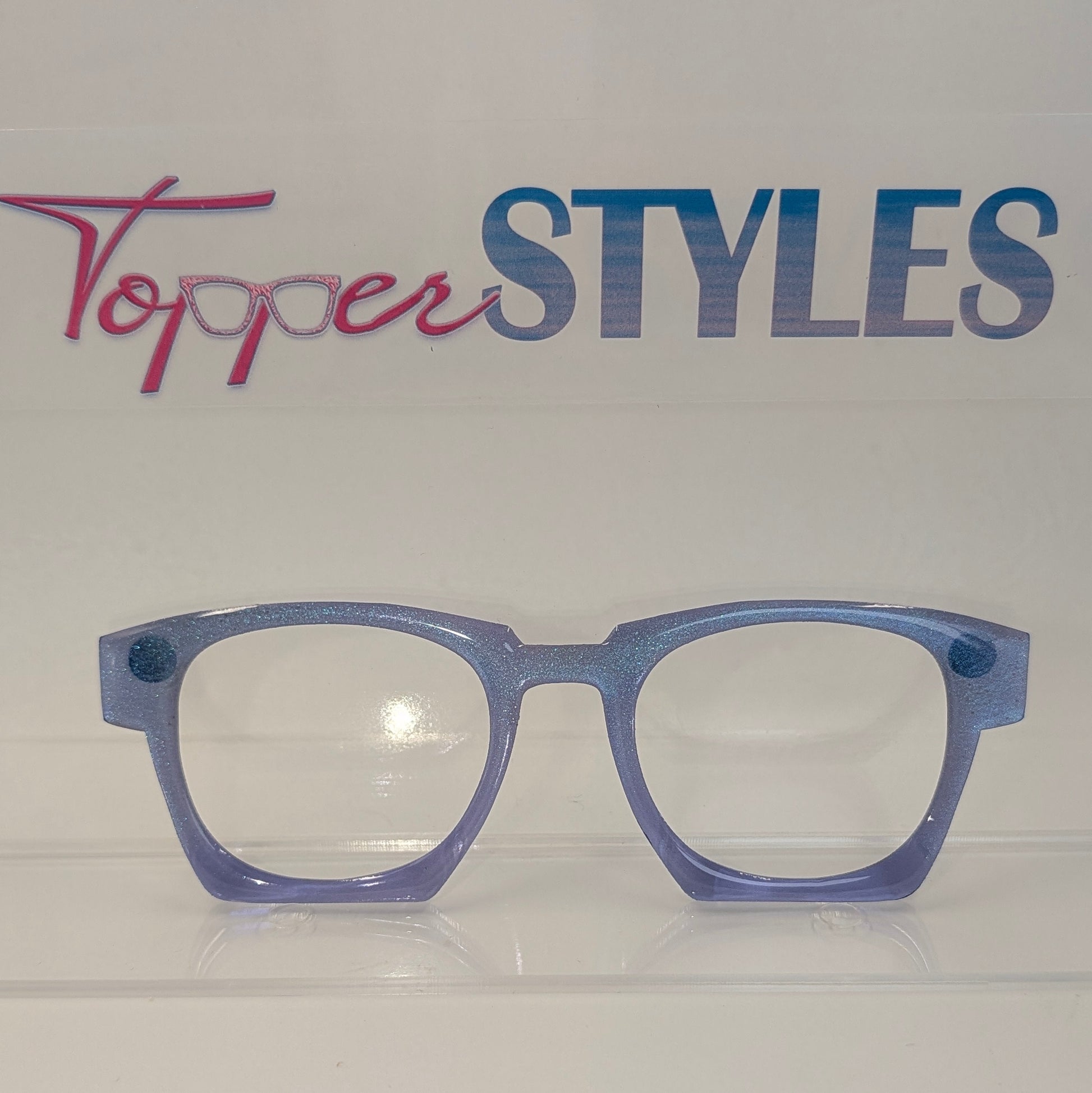 Blue eyeglasses on a white background with 'Topper Styles' branding.